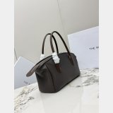 The Row Ewa curved handbag