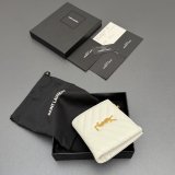 CASSANDRE MATELASSE bi-fold wallet in grain leather