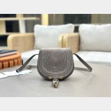 Marcie saddle bag in suede leather