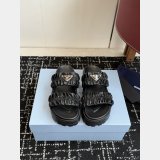 Prada Matelasse nappa leather flatform slides